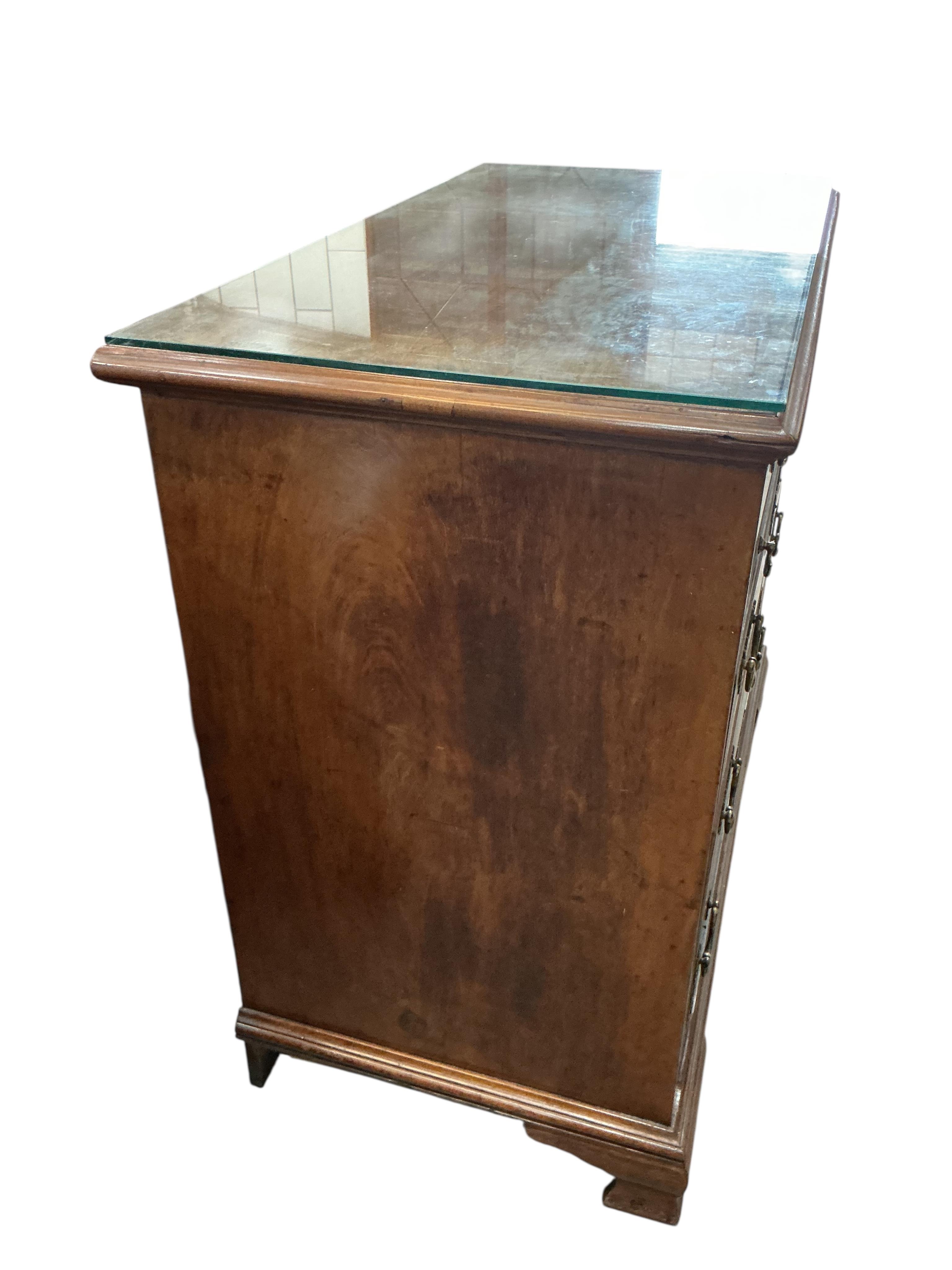 A George III mahogany chest with brushing slide, width 97cm, depth 50cm, height 86cm